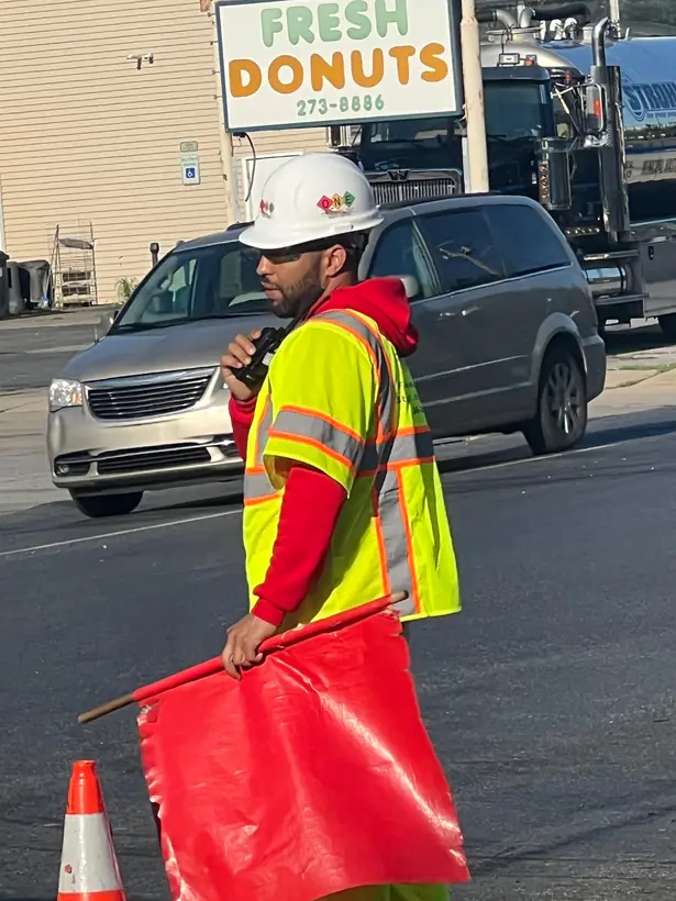Crew member coordinating with radio